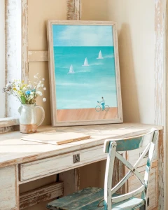 Nad morzem - rower i żagle - aranżacja plakatu na biurku